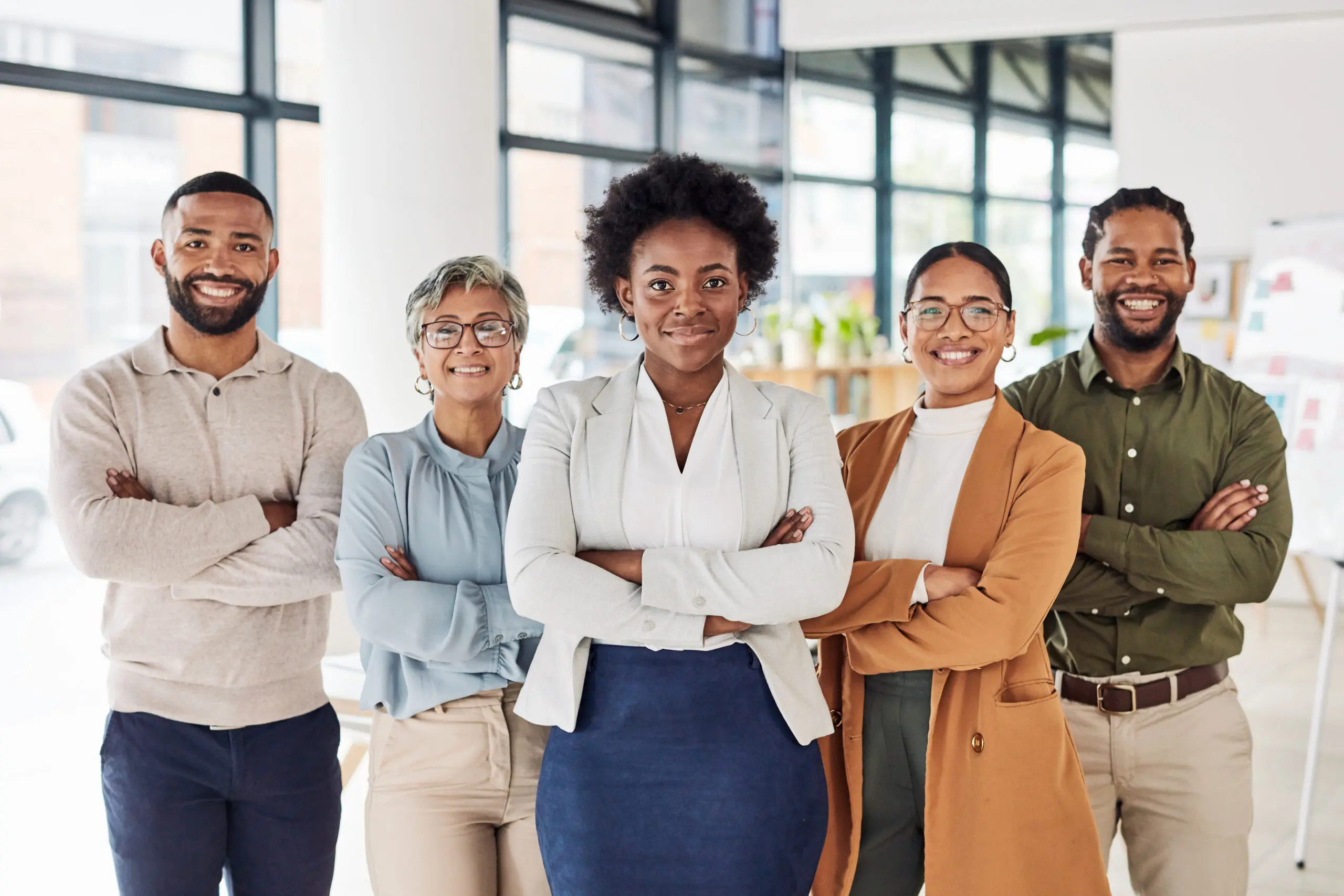 Portrait, business people and team in office for vision, mission and partnership, proud and support. Leader, collaboration and teamwork by colleagues with idea, mindset and corporate company goal