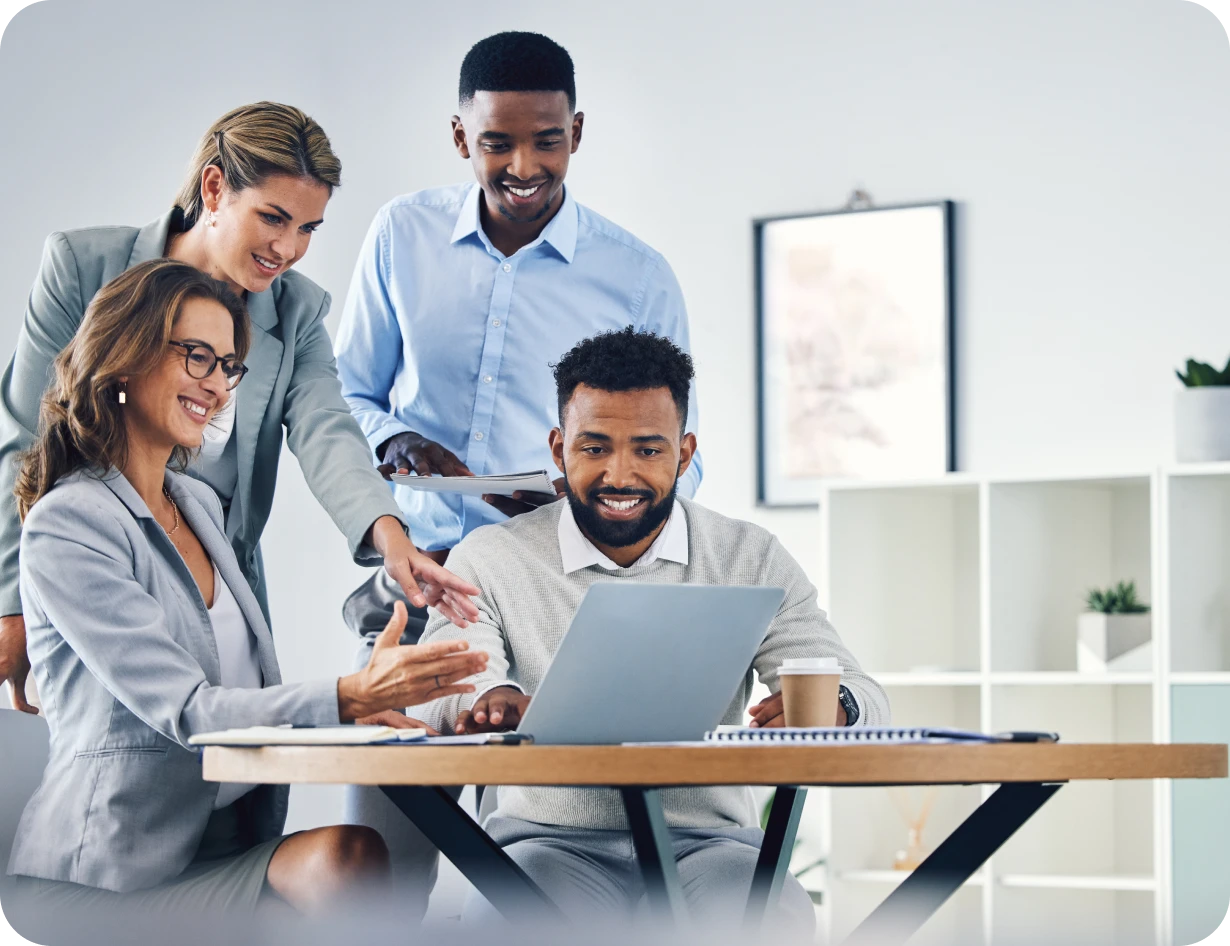 Colleagues smiling during a meeting