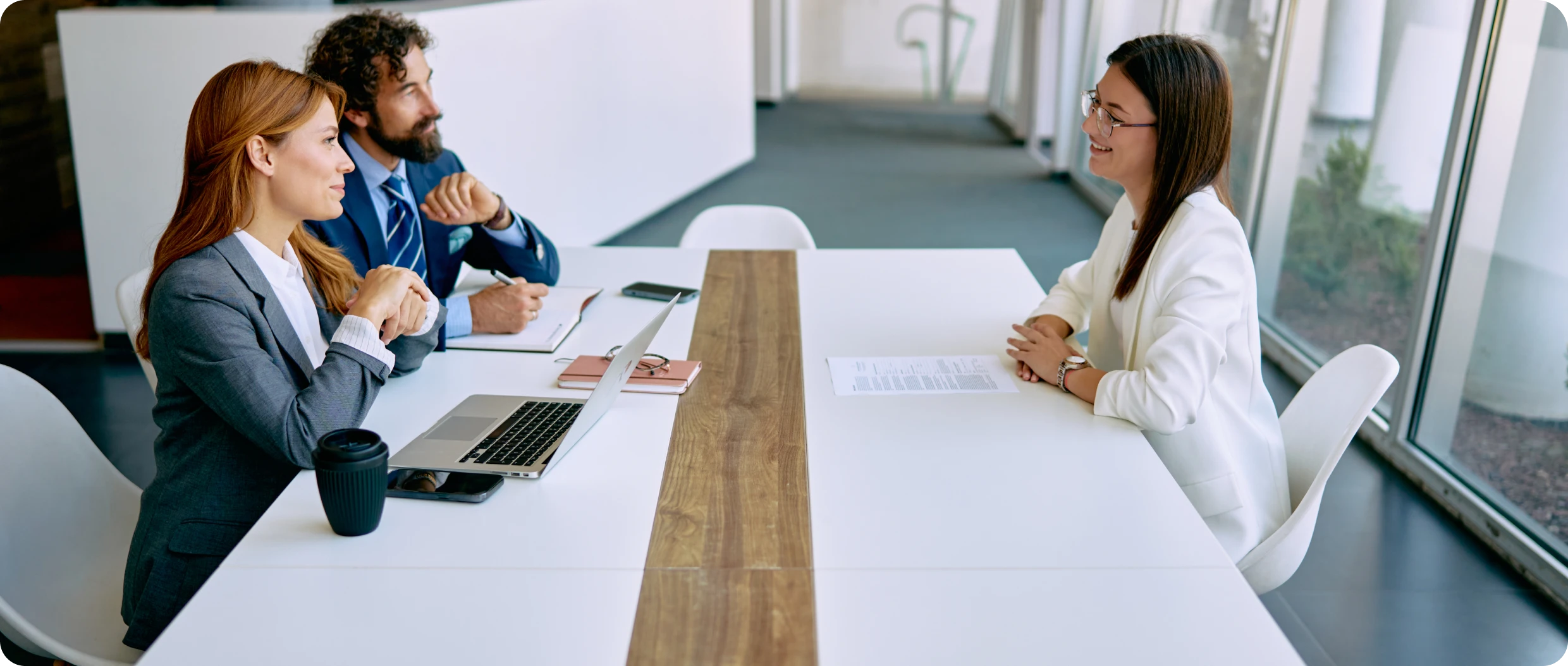 Professional meeting with three people